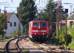 Ein ganz seltener Anblick....jedenfalls im Jahr 2013. Vor mehr als 10 Jahren war es Alltag im Saarland, eine 181er vor einem Güterzug zu sehen. Am 23.09.2013 gab es eine seltene Ausnahme. 181 218-9 war auf der Saarstrecke unterwegs. Sie beförderte einen Güterzug mit Stahlerzeugnissen von der Dillinger Hütte zum Saarbrücker Rbf. Die Lok war 2011 in Dessau wegen eines Rißes am Rahmen, ist aber seit Juli 2011 wieder voll einsatzfähig. Hier ist 181 218 bei der Einfahrt in den Saarlouiser Hauptbahnhof. Einen Gruß an Rocco  unseren  Lokführer! Bahnstrecke 3230 Saarbrücken-Karthaus.
Das Photo wurde natürlich vom Bahnsteig aus gemacht, durch die 200mm Telewirkung wirkt es natürlich anders.