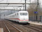 DB - ICE unterwegs von Bern nach Thun - Interlaken bei der durchfahrt in Münsingen am 15.03.2014