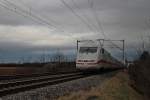 Nachschuss am 03.01.2014 auf 401 084-9  Bruchsal , als ICE 276 (Interlaken Ost - Berlin Ostbahnhof) an dem kleinen Winzerörtchen Hügelheim vorbeifuhr.