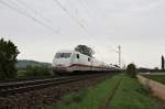 Am 18.04.2014 fuhr 401 573-1 als ICE 278 (Interlaken Ost - Berlin Ostbahnhof) nördlich von Müllheim (Baden) seinem nächstem Zwischenhalt in Freiburg (Brsg) Hbf entgegen.