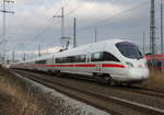 411 564-8 als ICE 1725(Rostock-München)bei der Ausfahrt im Rostocker Hbf.13.01.2018