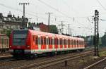 423 101-5 der S-Bahn Mnchen als Lr Richtung Krefeld bei der Durchfahrt in Kln-West, 30.4.11