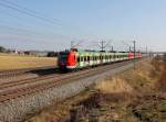 Der 423 617 und der 423 085 am 18.03.2016 unterwegs bei Unterweilbach.