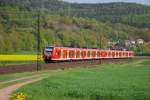 Schon wieder so eine  Sonderfahrt . 425 122-9 und 319-1 berraschten uns am 25.04.2009 zwischen Mecklar und Friedlos. Eigentlich gehren sie nach Baden Wrttemberg. Sie tragen das  Drei Lwen Takt  Logo.