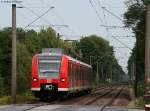 425 315-9 als RE 14680 (Bremen Hbf-Nordenham) in Heidkrug 20.8.09