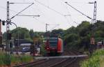 RE8 am Bahnbergang Klner Strae in Jchen an der Kbs 465 auf dem Weg nach Mnchengladbach....am 30.5.2012