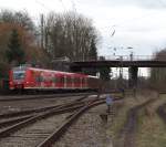 425 090-8, getauft auf den Namen  Saarlouis , hat als RE 60 nach Trier Einfahrt nach Bous.