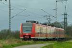 Nachschuß auf den 425 561-8 der als RB 33 nach Aachen fahrend hinter Wickrath Dahlerweg.