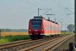 Aus Herrath in Richtung Wickrath kommt der 425 074-2 als RB33 nach Duisburg auf den Fotografen zugefahren.