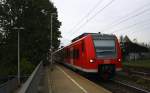 Die Rhein Niers Bahn (RB33) kommt die Kohlscheider-Rampe hoch und fährt durch Kohlscheid aus Duisburg-Hbf-Heinsberg-Rheinland) und fährt in Richtung Richterich,Laurensberg,Aachen-West.