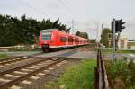 425 583-2 als RB33 nach Aachen Hbf am Bü Herrather Linde.