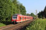 425 033 am 16.07.2015 mit weiterer Einheit am Bü Caspersbroicher Weg in Solingen.