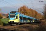 Westfalenbahn, geführt von ET 003, am Ortsrand von Hasbergen am 21.10.2014 um 14.27 Uhr auf dem Weg nach Münster.