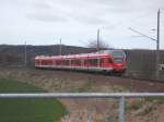 RE 13162 Sassnitz-Lietzow,am 13.April 2015,gefahren von 429 028,bei Borchtitz.