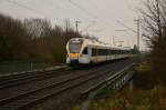 Am verregneten Valentinstag kommt der ET 7.06 der Eurobahn als RE13 nach Mönchengladbach bei Büttgen vor meine Linse.