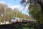 Ein ICE1 mit dem Triebkopf 401 554-1 in Marl-Sinsen, 23. April 2023