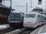 DB BR 401 mit ICE 72 Interlaken-Ost-Hamburg-Altona und BLS RBDe 565 971 mit REG 4857 Spiez-Interlaken-Ost am 15.02.03 in Spiez