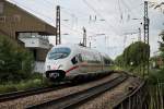 403 563-0 am 12.07.2014 auf dem Weg nach Basel SBB, als er das Stellwerk am Abzweig Leutersberg passiert.