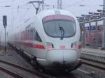 411 578-8(ICE-T Ostseebad Warnemnde)als ICE1611 von Warnemnde Richtung Mnchen Hbf bei der Ausfahrt im Rostocker Hbf.Aufgenommen am 19.03.2011