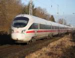 411 030-0  Jena als ICE 1509(Warnemnde-Mnchen)bei der Durchfahrt um 08:26 Uhr im Haltepunkt Rostock-Bramow.28.02.2015