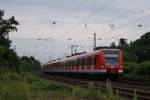 423 297-1 + 423 753-3 als S 11 nach Dsseldorf Werhahn bei der Einfahrt in Neuss Norf am 14.06.2008