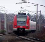 423 048/548 verlsst mit einer weiteren Einheit 423 den Bahnhof Merzenich als S12 in Richtung Hennef(Sieg). 31.01.09