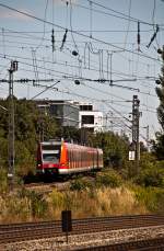 423 613  mit S7 am 01.08.2010 bei der Einfahrt in den Haltepunkt Heimeranplatz.