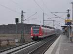 Ein vom 423 763 gefhrter S11-Zug verlsst gerade den HP Allerheiligen in Richtung Bergisch Gladbach, nchster Halt ist Nievenheim.