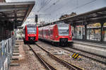 623 002 und 425 049-4 stehen am 18.4.2017 im Bahnhof Weinheim (Bergstr).