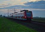 Eine abendliche Stimmung herrschte, als der 425 025-4 als RB33 nach Duisburg bei Wickrathhahn vor mein Objektiv fuhr.