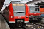 425 073-4 trifft am 27.12.2017 als S4 von Bruchsal nach Karlsruhe Hauptbahnhof im Mannheimer Hauptbahnhof auf einen n-Wagen Leerpark.