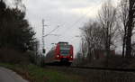 Die Rhein Niers Bahn (RB33) aus Duisburg-Hbf/Heinsberg-Rheinland) nach Aachen-Hbf und kommt aus Richtung Rheydt,Wickrath,Beckrath,Herrath,Erkelenz,Baal,Hückelhoven-Baal,Brachelen,Lindern,Süggerath,Geilenkirchen,Frelenberg,Zweibrüggen,Übach-Palenberg und fährt durch Herzogenrath,Worm in Richtung Herzogenrath,Kohlscheid,Richterich,Laurensberg,Aachen-West,Aachen-Schanz,Aachen-Hbf.
Aufgenommen von der Grenzstraße in Herzogenrath,Worm. Bei Sonne und Regenwolken am Nachmittag vom 28.2.2019.