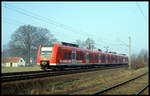 DB 425587 ist hier am26.3.2003 bei Ibbenbüren-Esch als RB nach Paderborn unterwegs.