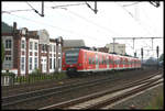 DB 425524 fährt am 25.9.2005 in Melle in Richtung Osnabrück ab.