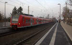 Die Rhein Niers Bahn (RB33) kommen die Kohlscheider-Rampe hoch aus Duisburg-Hbf/Heinsberg-Rheinland) nach Aachen-Hbf und halten in Kohlscheid und fahren in Richtung Richterich,Laurensberg,Aachen-West,Aachen-Schanz,Aachen-Hbf. 
Aufgenommen von Bahnsteig 1 in Kohlscheid. 
Am Nachmittag vom 5.12.2019.
