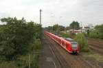 425 764-8 & 425 fahren als RB44 von Mannheim Hbf nach Mainz Hbf. Der Zug hat gerade den Bahnhof von Ludwigshafen-Oggersheim verlassen. 29.08.2007
