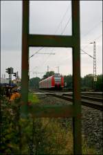 426 516/016 und 425 071/571 fahren als RE16 (RE 29684)  RUHR-SIEG-EXPRESS  nach Essen.