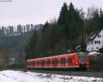 425 306-8 als RE 19648 (Rottweil-Stuttgart Hbf) am Esig Epfendorf 26.2.09