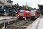 Treffen zweier Traktionen in Rottweil.611 528 vor der Abfahrt nach Donauaueschingen, und 425 809 nach der Ankunft aus Stuttgart.Links wartet ein VT der HzL auf seine Abfahrt.Aufgenommen am 17.04.09.