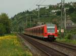 425 528-7 & 425 098-1 mit RE11316 von Koblenz nach Mnchengladbach hat gerade den Bahnhof Vallendar/Rhein verlassen.21.5.09