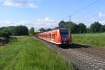 Der Triebzug 425 017/517 und noch ein unbekannter 425er sind am 30.05.09 als RE 25023 nach Frankfurt/M Hbf auf der KBS 630 Gieen-Frankfurt im Einsatz.Die Aufnahme entstand zwischen Groen-Linden und Langgns!!!