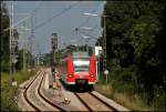 425 528-1 verlsst auf dem Weg nach Rosenheim den Bahnhof Bad Aibling.