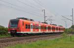 425 573 als RB35 nach Wesel am 09.05.2010 bei Voerde