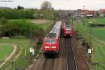 Whrend die 111 072-5 mit der RB 38855 (Manhheim-Karlsruhe) den Bahnhof Graben-Neudorf soeben verlassen hat, muss der ET 425 als RE 3862 (Karlsruhe-Mainz) noch auf die Einfahrt in Graben-Neudorf