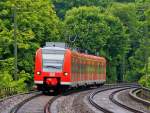 Quitschi 425 075 fhrt am 06.06.2012 nach einer heftigen Regenschauer von Aachen West kommend in Aachen Schanz ein.