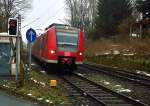 425 102 als RE8 am Bahnbergang in Jchen an der Mhle.