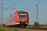 Am Abend des Pfingstmontag ist der 425 073-4 als RB 33 nach Aachen bei Wickrathhahn.9.6.2014