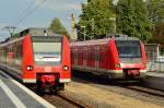 Zwei Generationen Nahverkehrstriebwagen in Korschenbroich.....S8 rechts und links ein Umleiter RE11. 3.8.2014