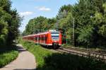 425 024-7 als RB33 auf dem Weg nach Aachen Hbf. Aufgenommen am 18/07/2015 in Übach-Palenberg.