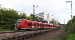 Stretch Quietschie! 425 133 und zwei 426er machen schon was daher, jedenfalls was die Länge betrifft! Im Hbf. Saarbrücken, der gleich erreicht wird, werden sich wohl die Wege der Triebwagen trennen. RE Kaiserslautern - Trier beim Postbankgebäude (ehemaliges Postgiroamt) in Saarbrücken. Bahnstrecke 3250 Saarbrücken - Homburg Saar. 29.09.2013